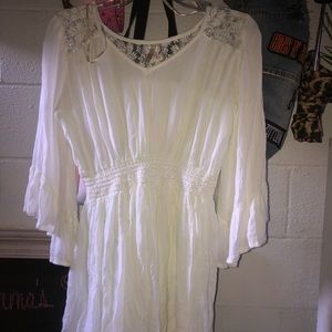 White with lace beach cover up or dress.